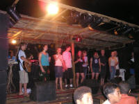 presenting on the beach stage of an Amazon River tributary